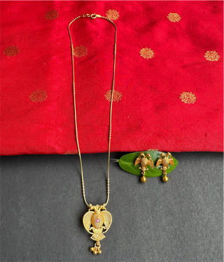 The Yashvi Silver Gandaberunda Pendant & Earrings