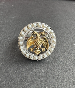 The Rujuta Silver Gandaberunda Adjustable Finger Ring (Pearl- 2 Tone)