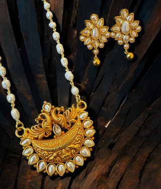 The Abhishti Nakshi Silver Pearl Peacock Necklace & Earrings