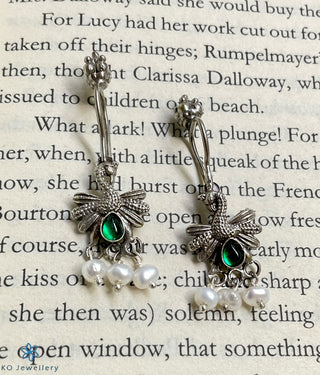 The Navilu Silver Peacock Bugudi Earrings (Clip on)