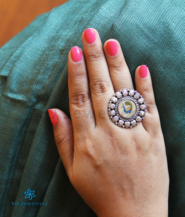 The Vama Silver Peacock Finger Ring