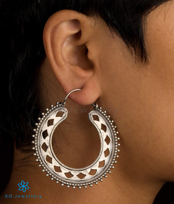 Statement silver earrings with modern design