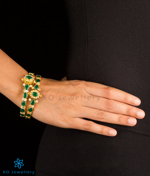 gold plated silver bangles with green gemstones