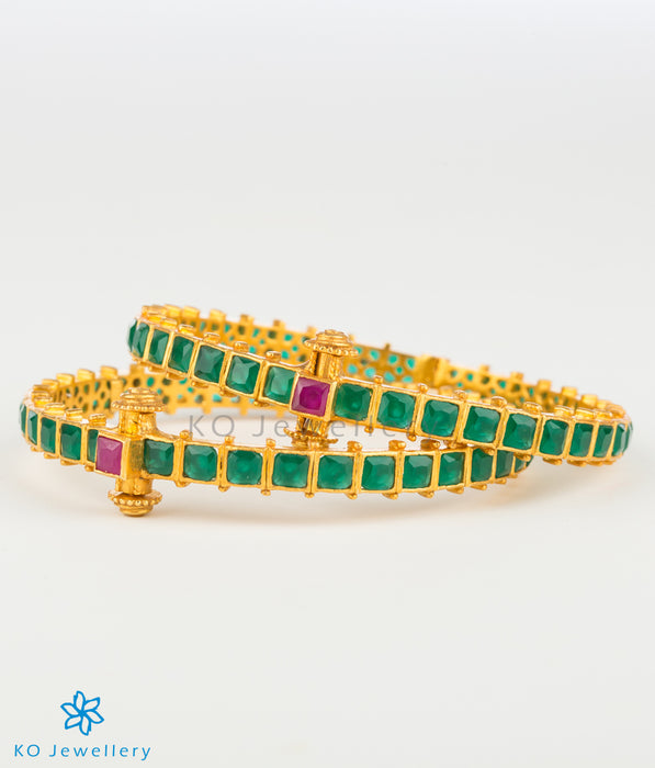 Openable gold coated bracelet with green stones
