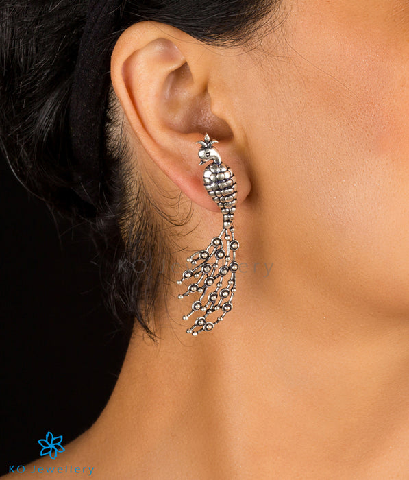The Tanuruha Silver Peacock Earrings