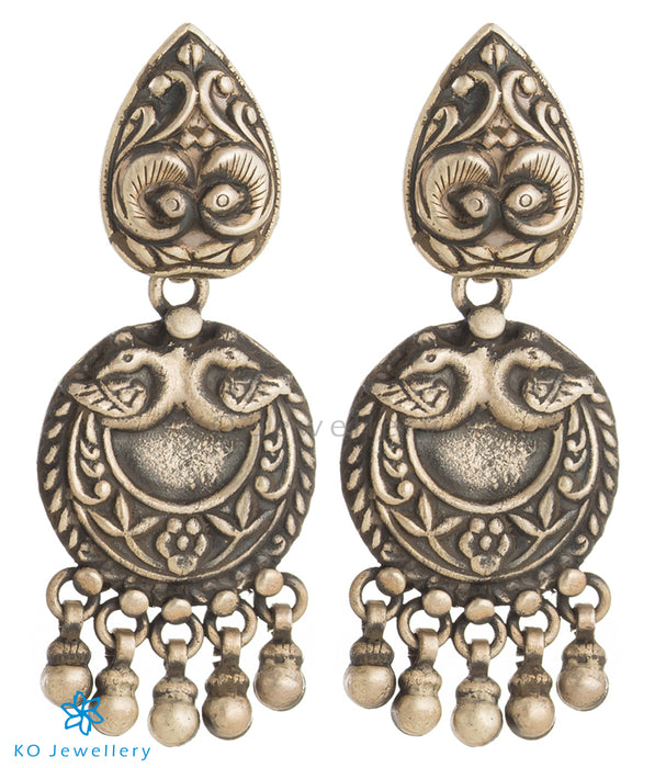The Vama Silver Peacock Earrings