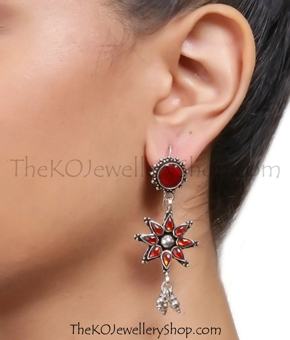 Crafted in pure Sterling Silver (92.5%), bits of  red glass have been used to decorate, shop online.
