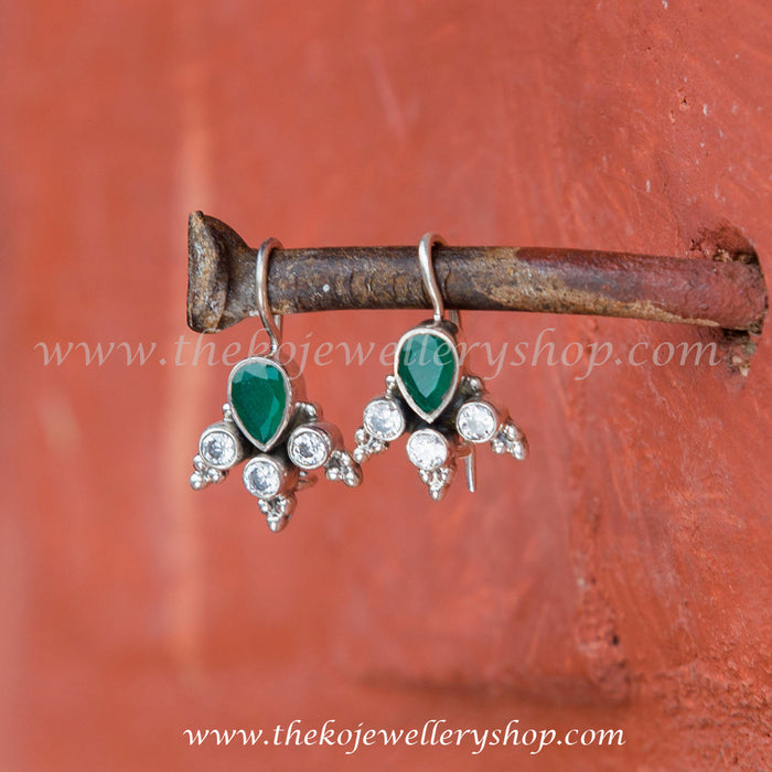 green zircon studded earrings for women