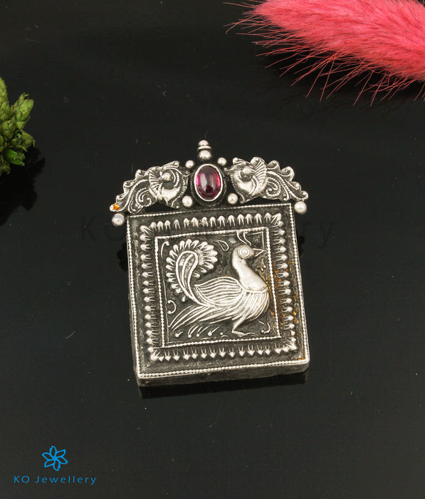 The Nrtu Silver Peacock Pendant