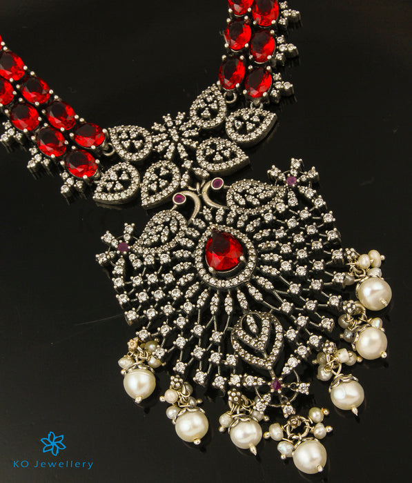 The Ahirupu Silver Peacock Statement Necklace