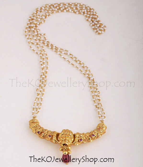 Gold plated temple jewellery pendant in strings of pearls