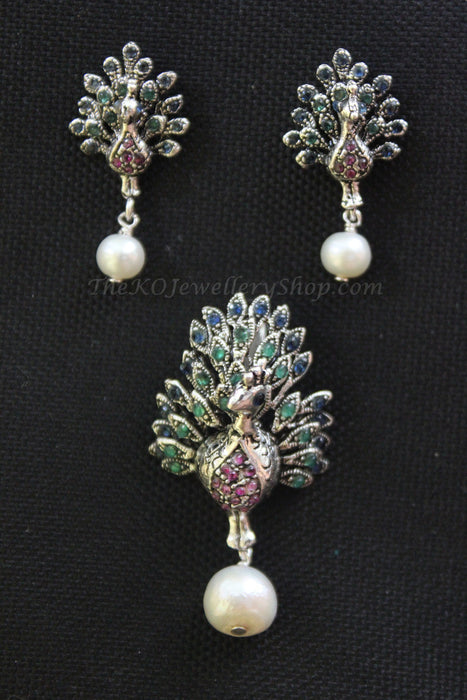 Hand crafted peacock motif pure silver pendant set  buy online 
