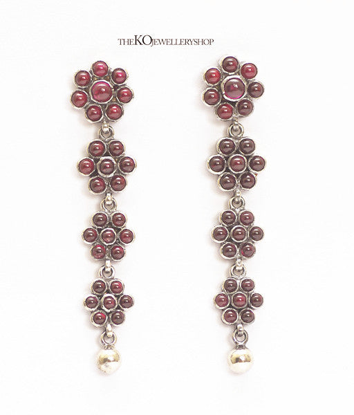 Contemporarily designed temple jewellery earrings with red stones