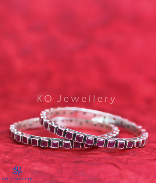 Silver and semi-precious stone bangles with red zircon